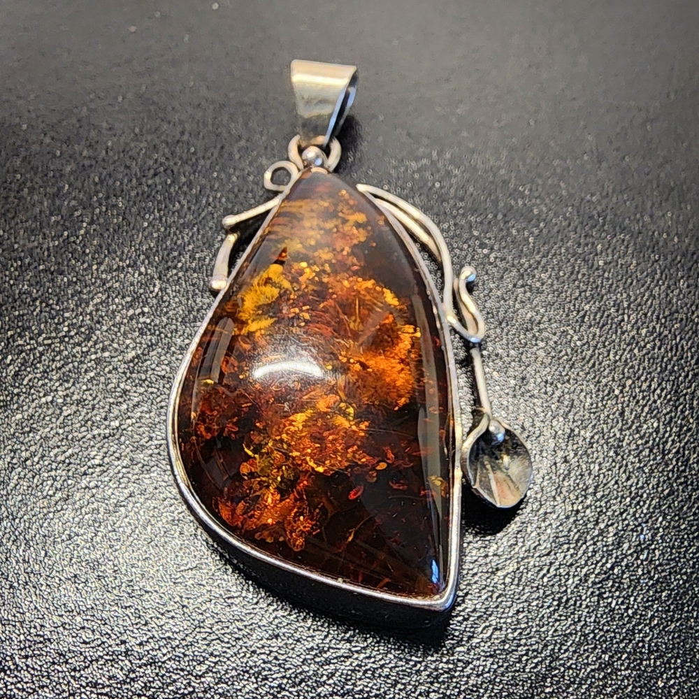 Elegant Amber Pendant with Silver Accents - Picture 2 of 5